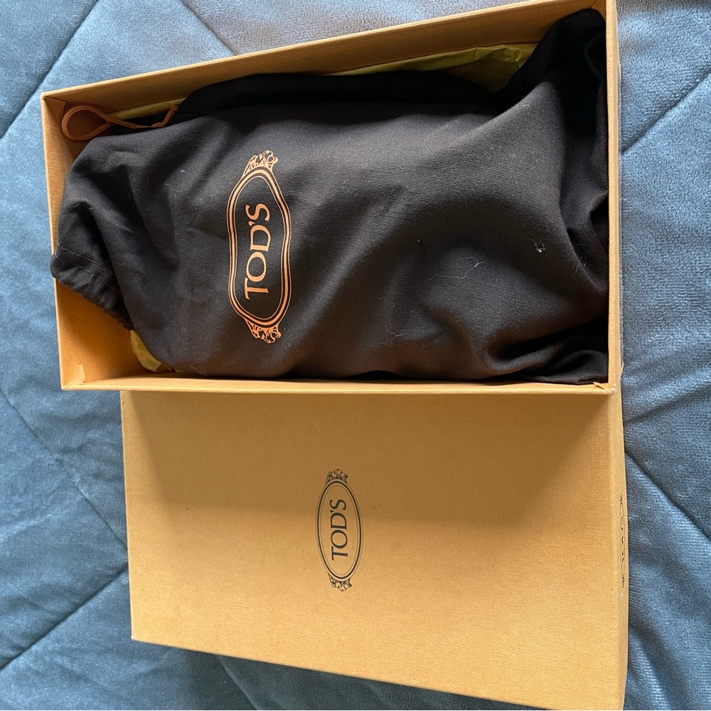 Tod's Black and Gold Dust Bag in Box